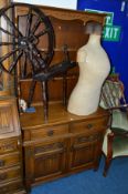 AN OLD CHARM OAK LINENFOLD DRESSER, with a two tier plate rack, two drawers and cupboard base,