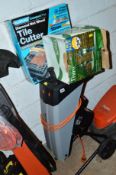 A TITAN RAPID SHREDDER, boxed pair of outdoor lanterns, a Plasplug tile cutter and a panasonic