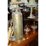 A VINTAGE BRASS PRESSURE SPRAYER, two copper kettles and a fire surround (4)