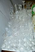 A QUANTITY OF CUT GLASSWARE, to include decanters, glasses, etc