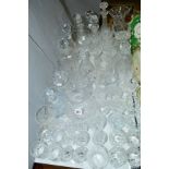 A QUANTITY OF CUT GLASSWARE, to include decanters, glasses, etc