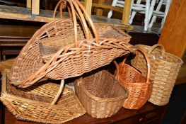 EIGHT VARIOUS WICKER BASKETS, including a baguette basket