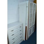 TWO WHITE TWO DOOR WARDROBES (one dismantled) and a similar chest of drawers (3)