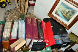 A BOX AND LOOSE SUNDRY ITEMS, to include four albums of postcards 'stamps', classical collection