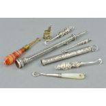 TWO EDWARDIAN SILVER RETRACTABLE PENCILS, FIVE BUTTON HOOKS AND A CHARM, the retractable pencils