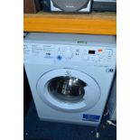 AN INDESIT 7KG WASHING MACHINE