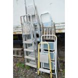 A QUANTITY OF STEP LADDERS, to include seven aluminium and one wooden (8)
