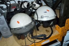 THREE AVIATION HELMETS WITH MICROPHONES, and headphones and an FM motorcycle helmet