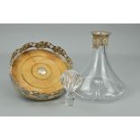 AN ELIZABETH II GLASS SHIP'S DECANTER WITH SILVER MOUNTED COLLAR, fruiting vine design, with