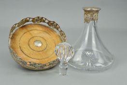 AN ELIZABETH II GLASS SHIP'S DECANTER WITH SILVER MOUNTED COLLAR, fruiting vine design, with
