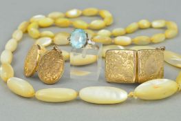 FOUR ITEMS OF JEWELLERY, to include two early 20th Century gold front and back lockets, one oval,