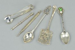 A SMALL PARCEL OF SILVER AND PLATE, including a pair of sugar tongs, a silver and enamel teaspoon, a