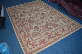 A MODERN LAURA ASHLEY CARPET SQUARE, red and gold ground with folate design, approximate size
