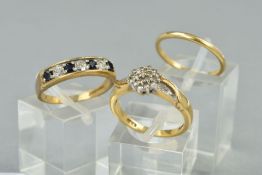 A COLLECTION OF RINGS, to include a 9ct gold diamond cluster ring, cross over design, total