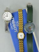 THREE TISSOT WATCHES, to include a green Rock watch with leather strap, a lady's watch with circular