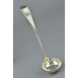 A MID VICTORIAN SILVER LADLE, with bright cut engraved decoration to the handle, hallmarked John