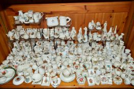 A LARGE COLLECTION OF CRESTED WARES, to include W H Goss 'Model of Ancient Cup dig near Castle