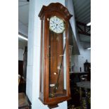 A MODERN KERMLE MAHOGANY WALL CLOCK, approximate height 114cm (two weights, winding key and