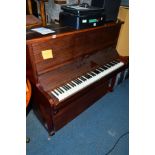 A MAHOGANY UPRIGHT PIANO