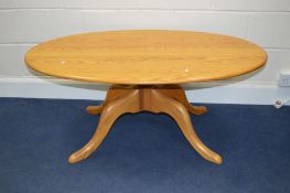 AN ERCOL BLONDE ASH OVAL TOPPED COFFEE TABLE, on a pedestal base, approximate size width 123cm x