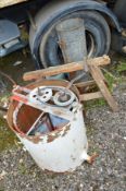 A GALVANISED HONEY EXTRACTOR, tall galvanised tub with valve, copper tub, saw horse and a 56lb