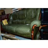 A GREEN LEATHER WOOD FRAMED THREE PIECE SUITE, with footstool (4)