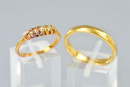 A 22CT GOLD BAND RING AND A FIVE STONE DIAMOND RING, the band ring hallmarked Birmingham 1966,