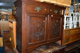 AN EDWARDIAN MAHOGANY TWO DOOR CABINET, with two drawers