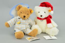 TWO STEIFF TEDDY BEARS, 'Victor' No 111716, white fur wearing santa hat and a scarf, height 30cm,