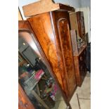 A VICTORIAN WALNUT TRIPLE DOOR WARDROBE (adapted and losses)