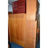 A LIGHT OAK AVALON TWO PIECE BEDROOM SUITE, comprising of two wardrobes and a teak chest of