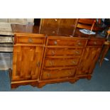 A YEW WOOD BREAKFRONT SIDEBOARD