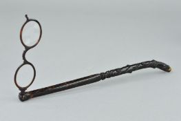 A PAIR OF LATE 19TH CENTURY TORTOISESHELL LORGNETTES, the long arm with a carved twist design