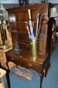 A 20TH CENTURY OAK DRESSER, with three tier plate rack, double cupboard doors above two drawers,