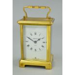 A BRASS CASED CARRIAGE CLOCK, the dial marked 'Bayard & Day Made in France', height 14.5cm including