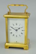 A BRASS CASED CARRIAGE CLOCK, the dial marked 'Bayard & Day Made in France', height 14.5cm including