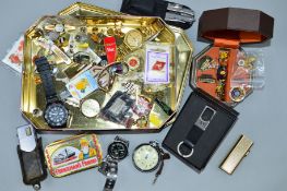 A SELECTION OF ITEMS, to include pin badges, watches, lighters etc