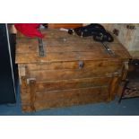 A VINTAGE PINE SLOPED TRUNK, with iron banded hinges and four pivetted handles to each corners and