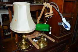 A BRASS DOMED DESK LAMP, a brass table lamp and another lamp (3)