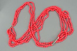 A CORAL COLOURED BEAD NECKLACE, designed as eight rows of spherical treated and dyed coral beads