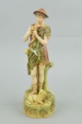 A ROYAL DUX FIGURE, Shepherd playing pan-pipes, pink triangle mark and impressed 351, height 31.5cm