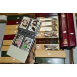 A LARGE COLLECTION OF CIGARETTE CARDS IN ELEVEN ALBUMS AND AN EXTENSIVE COLLECTION OF VINTAGE