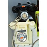 TWO BAKELITE TELEPHONES, one in ivory, with cheese dish drawer and braided cord, some damage to