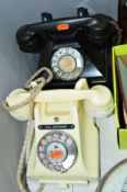 TWO BAKELITE TELEPHONES, one in ivory, with cheese dish drawer and braided cord, some damage to