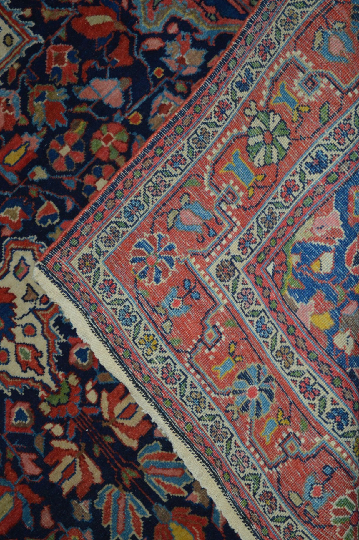 A 20TH CENTURY WOOLLEN CAUCASION RUG, red and deep blue ground, with foliate design, 205cm x - Image 3 of 4