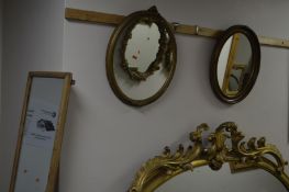 A 19TH CENTURY GILT FRAMED OVAL WALL MIRROR, another wall mirror and a rectangular wall mirror (3)