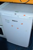 A BEKO UNDER COUNTER FRIDGE, and a microwave (2)