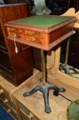 AN EARLY 20TH CENTURY WALNUT SWIVEL GAMES TABLE, on a cast iron base, with five various drawers