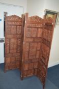 A 20TH CENTURY HARDWOOD FOUR FOLD SCREEN, with pierced leaf detail, approximate size width 200cm x