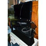 A 32' LCD TV, LG DVD player and a glass three tier TV stand (3)